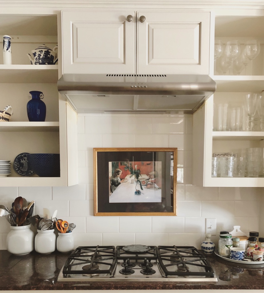 decorating with fine art in unexpected places in your home: even the kitchen!